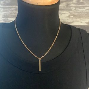 Gold tone single strand necklace bar pendant accent adjustable back